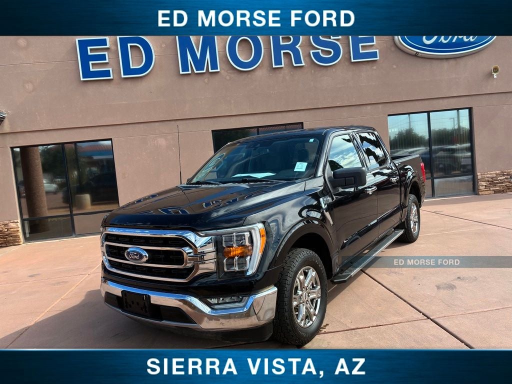 2021 Ford F-150 XLT in Agate Black Metallic — front three-quarter view