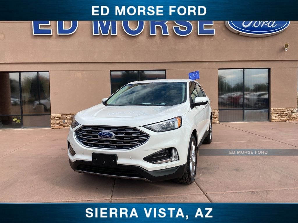 2023 Ford Edge Titanium in White Metallic — front three-quarter view