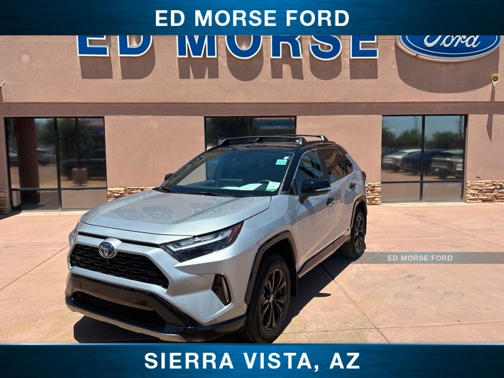 2024 Toyota RAV4 Hybrid XSE in Midnight Black Metallic — front three-quarter view