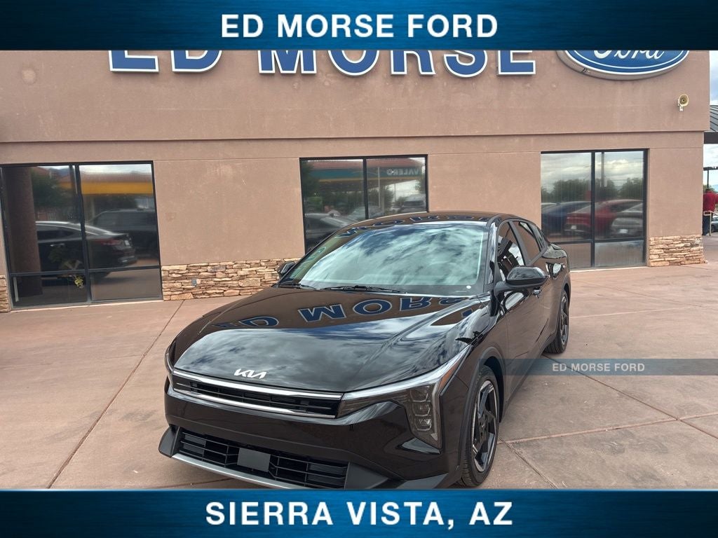 2025 Kia K4 EX in Aurora Black Pearl — front three-quarter view